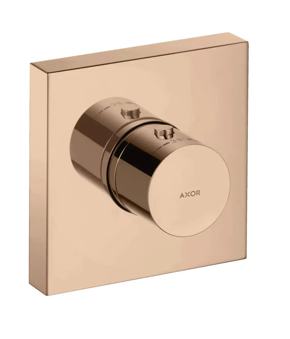 Thermostatmodul mit Drehknopf zur Temperaturregelung, installiert in einer rechteckigen Wandplatte, Marke AXOR, in glänzendem Rotgold-Finish.